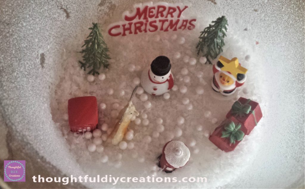 The telephone box, snowman and post box added to finish the Christmas Scene.