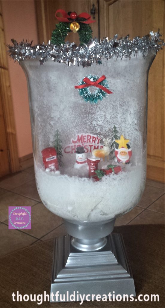 The Christmas Scene hot glued inside the glass jar.