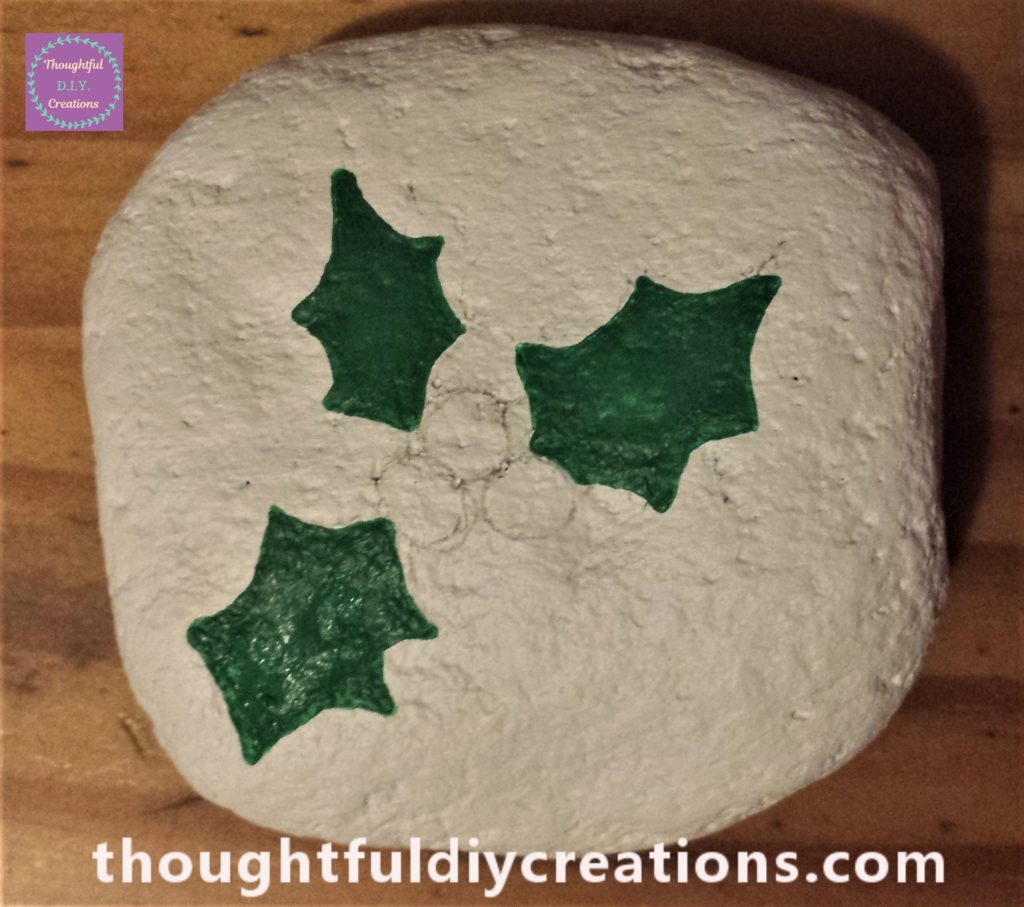 Second layer of green paint to the leaves.