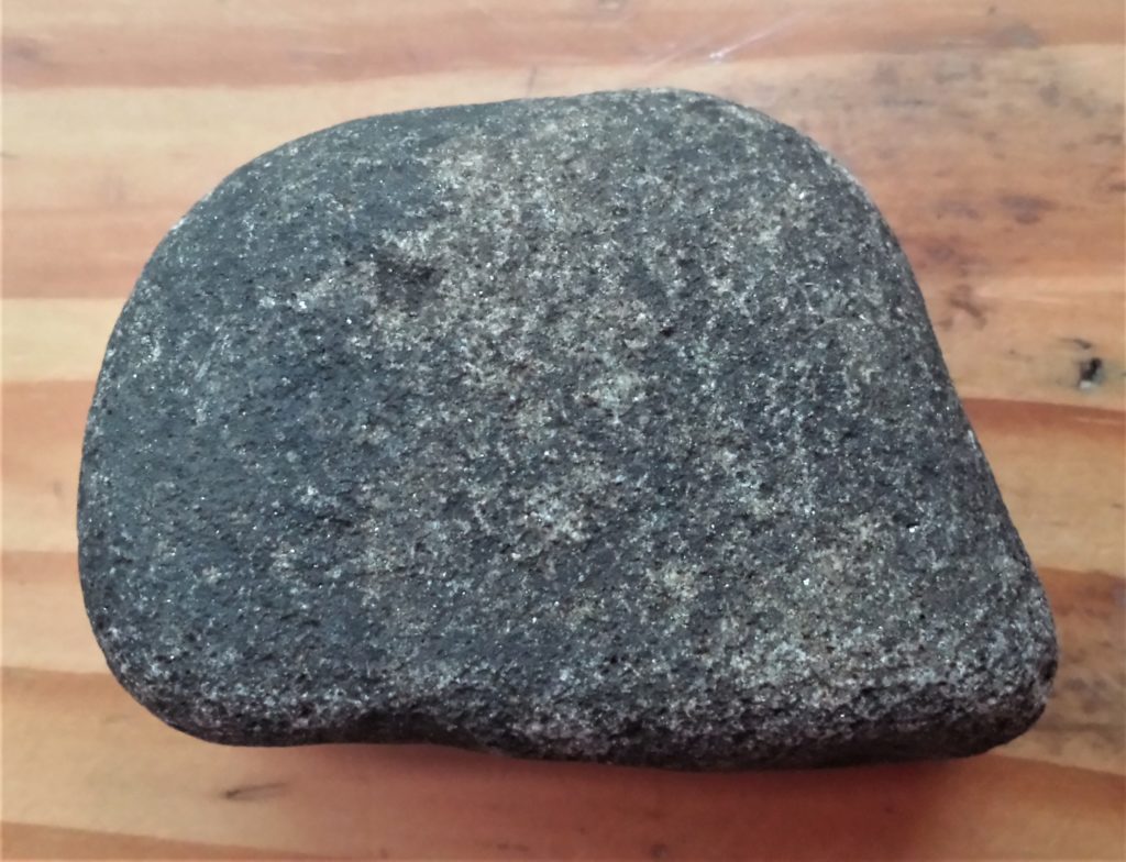 The stone before being painted red.