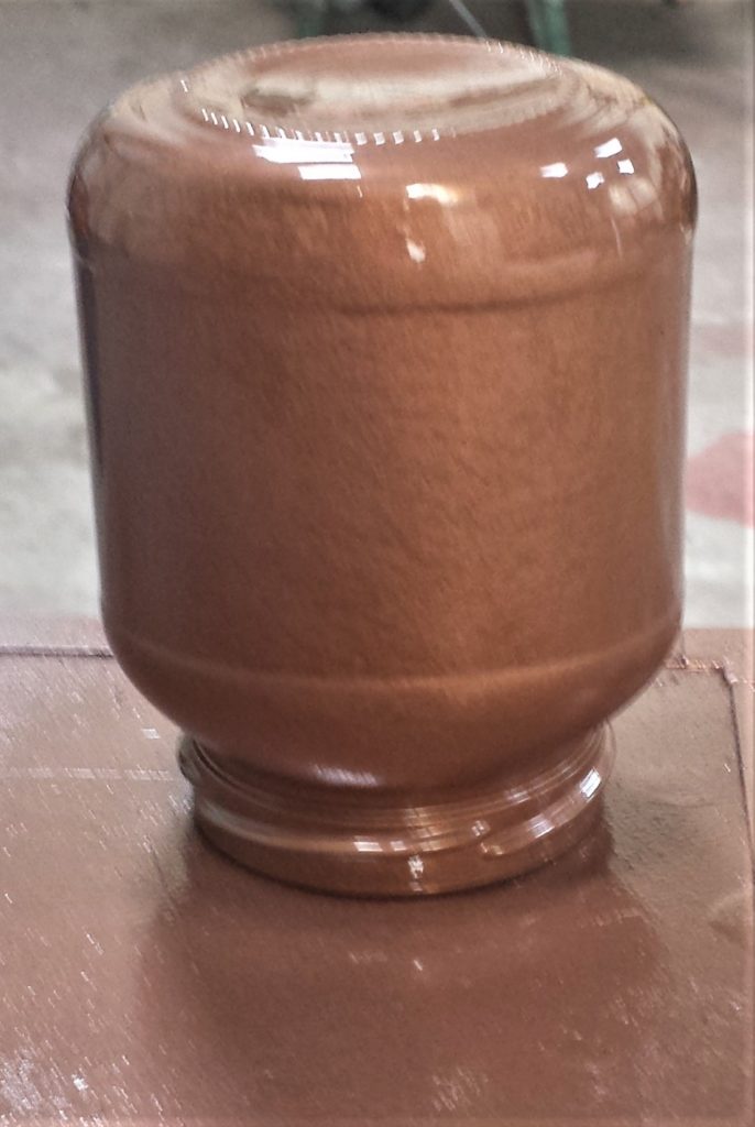 Second layer of spray paint on the third jar.