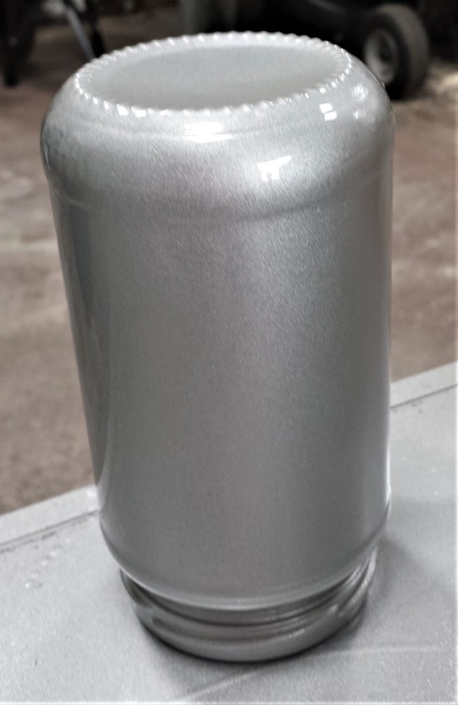 Third coat of spray paint added to the jar.