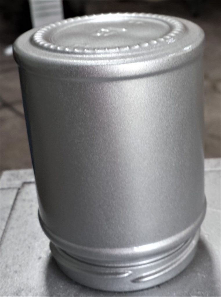 The fourth layer of spray paint to the smallest jar.