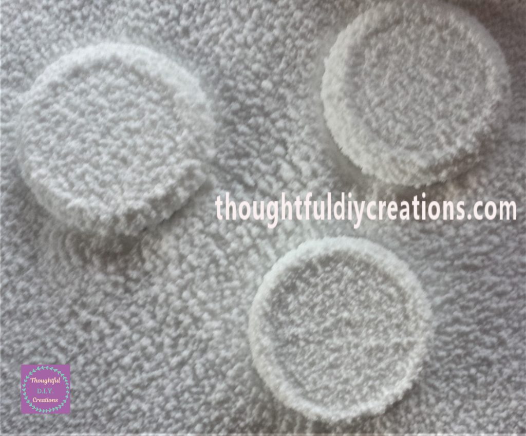 Second layer of snow spray added to each lid.