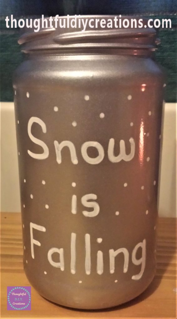 'Snow is Falling' wrote on the big silver jar and white dots added all over the jar.
