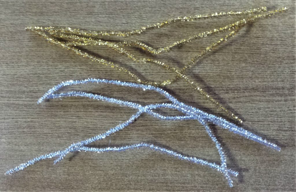 4 Glitter Silver and 4 Glitter Gold Pipe Cleaners.