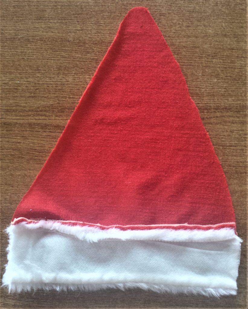 The Santa hat turned around to the back.