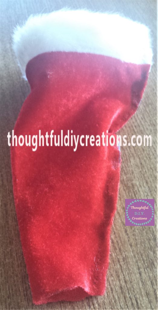 The top section of fabric cut off from the hat.