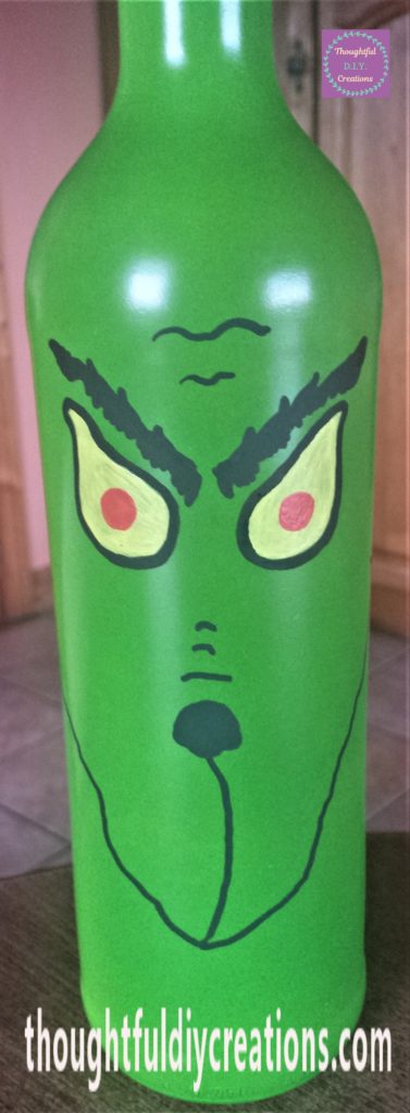 Red acrylic paint marker used for the middle of the Grinch's eyes.