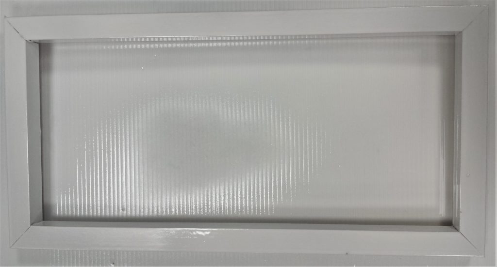 Second layer of spray paint on the frame.