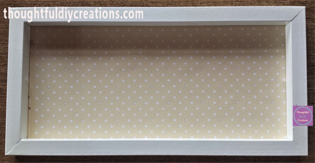 Front view of the frame attached to the backing board.