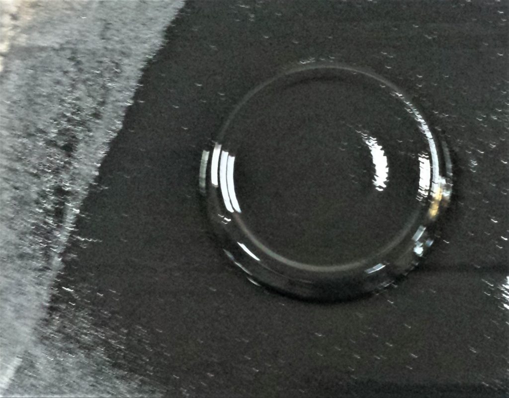 Second layer of spray paint on the lid.