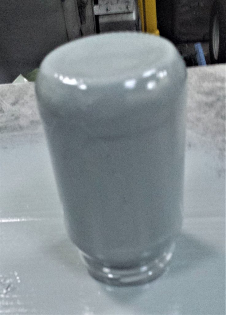 Third and final layer of spray paint on the jar.