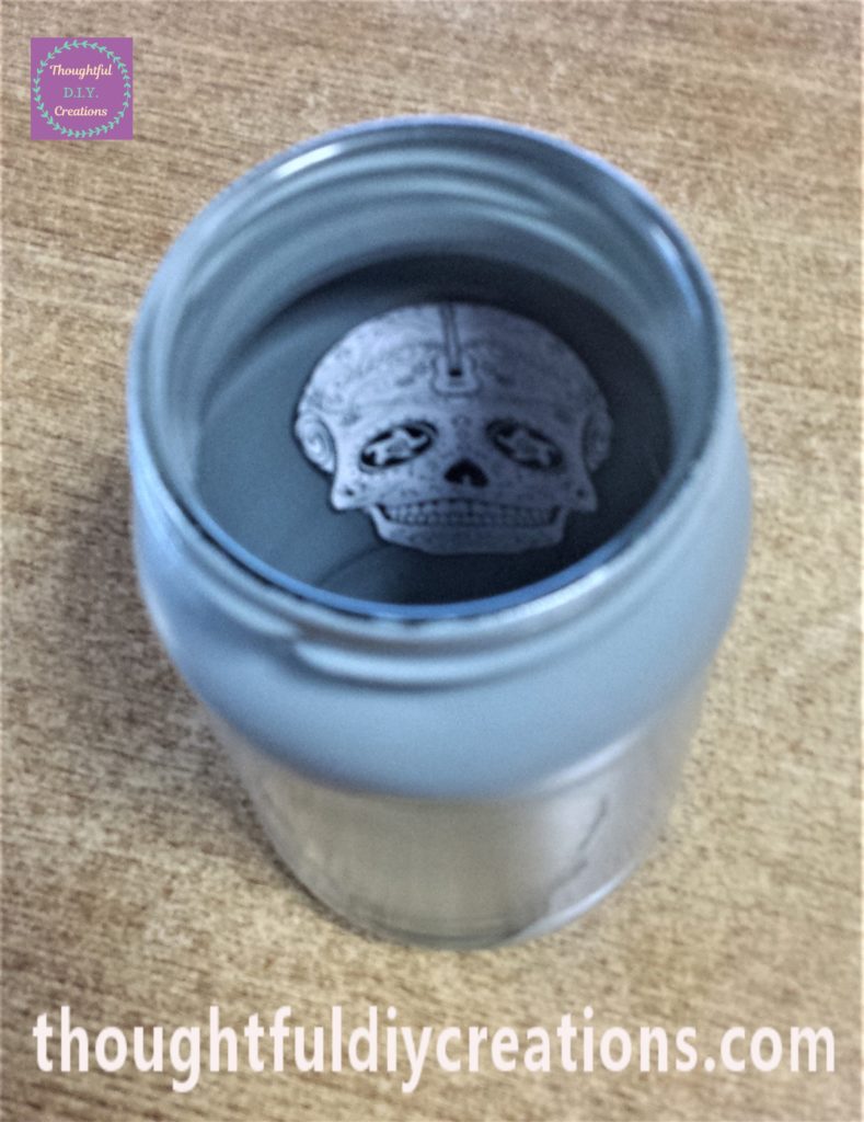 The skull image stuck down properly.