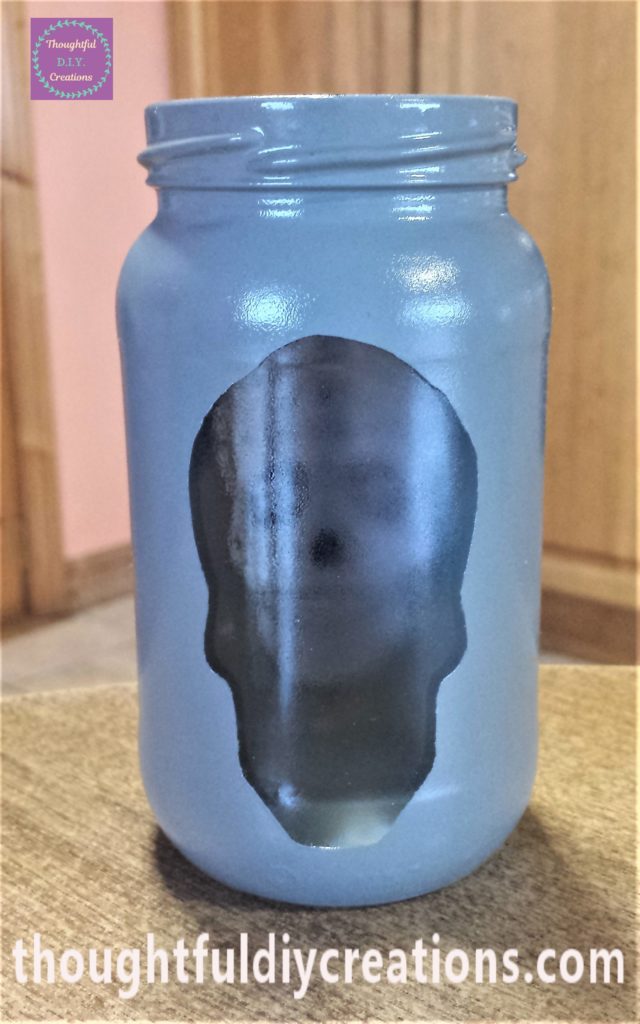 Front view of the skull image in the jar.