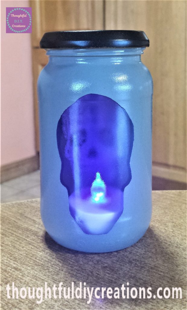 Colour blue from the t-light in the jar.