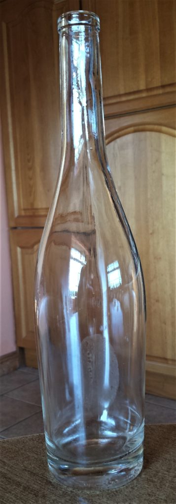 Wine Bottle after being soaked, label removed, rinsed and dried.