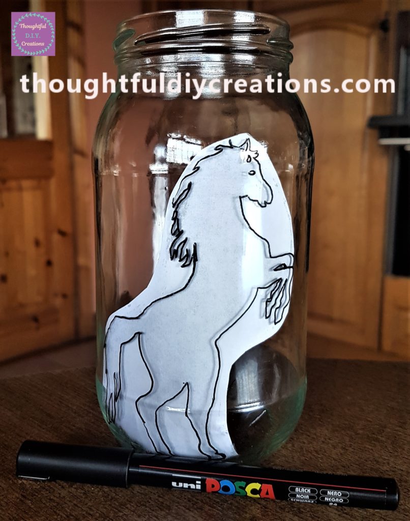 Traced around the Horse Silhouette using a uni POSCA Paint Pen in Black 0.7 mm.