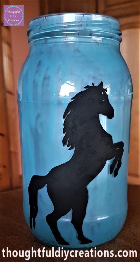 Another layer of paint and water mixture added to the inside of the jar.