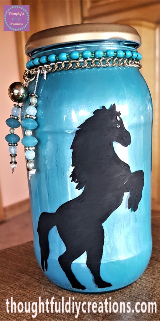 Teal beaded bracelet added under the lid of the jar.