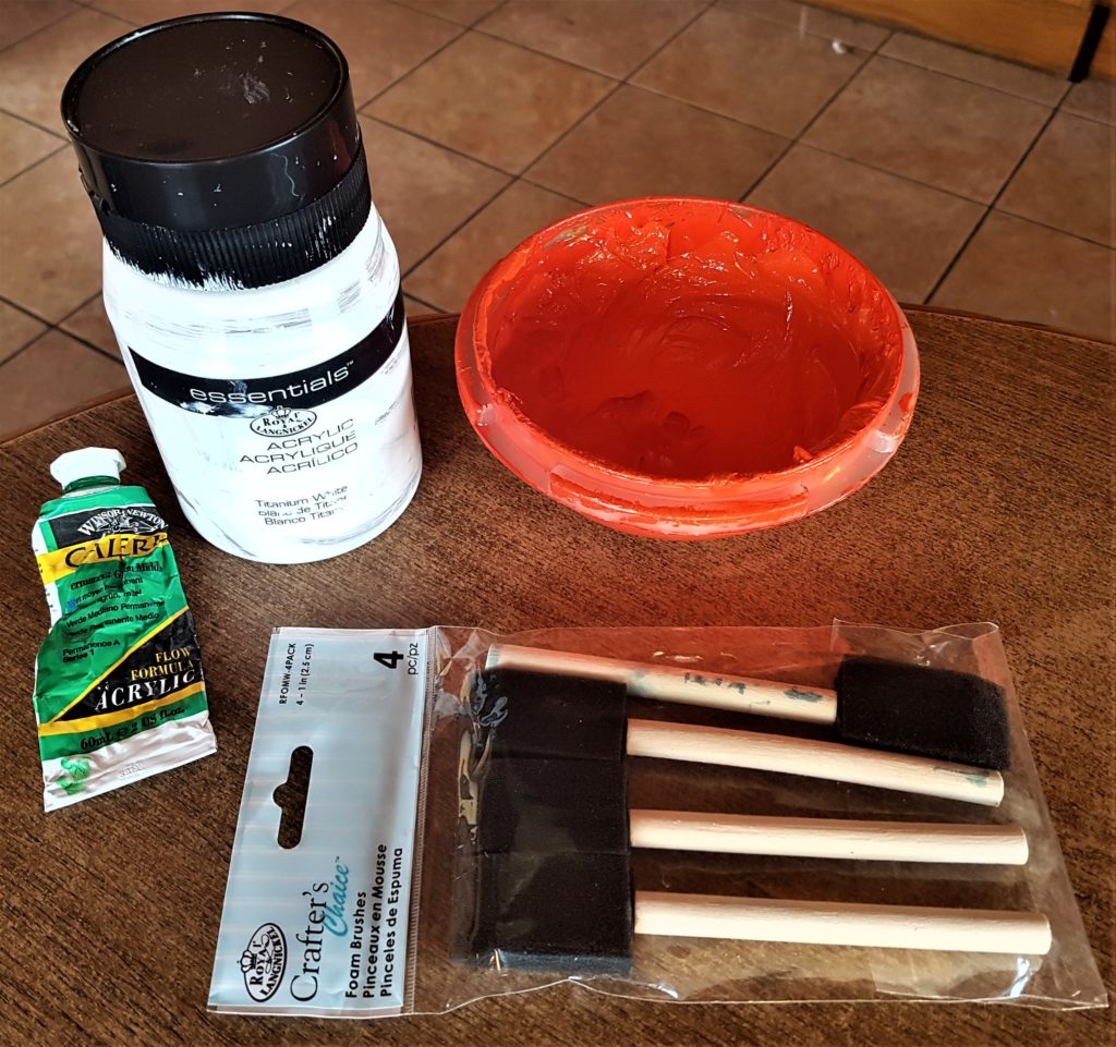 Green, white and orange acrylic paints for the Leprechaun door. Foam brushes for each colour.