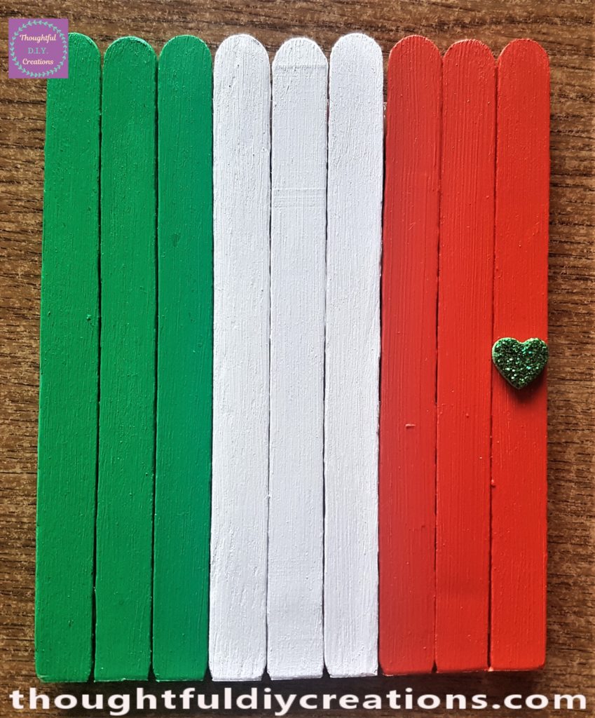 The bottom edge of the leprechaun door cut straight with a strong scissors.