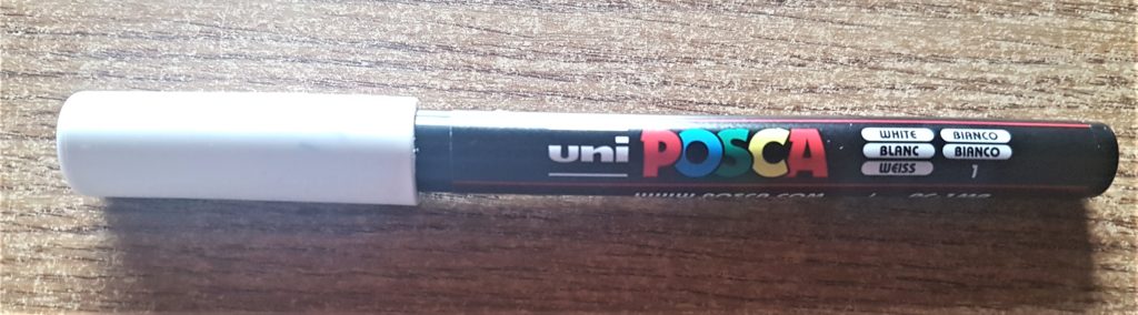 uni POSCA acrylic paint pen in white 0.7 mm.