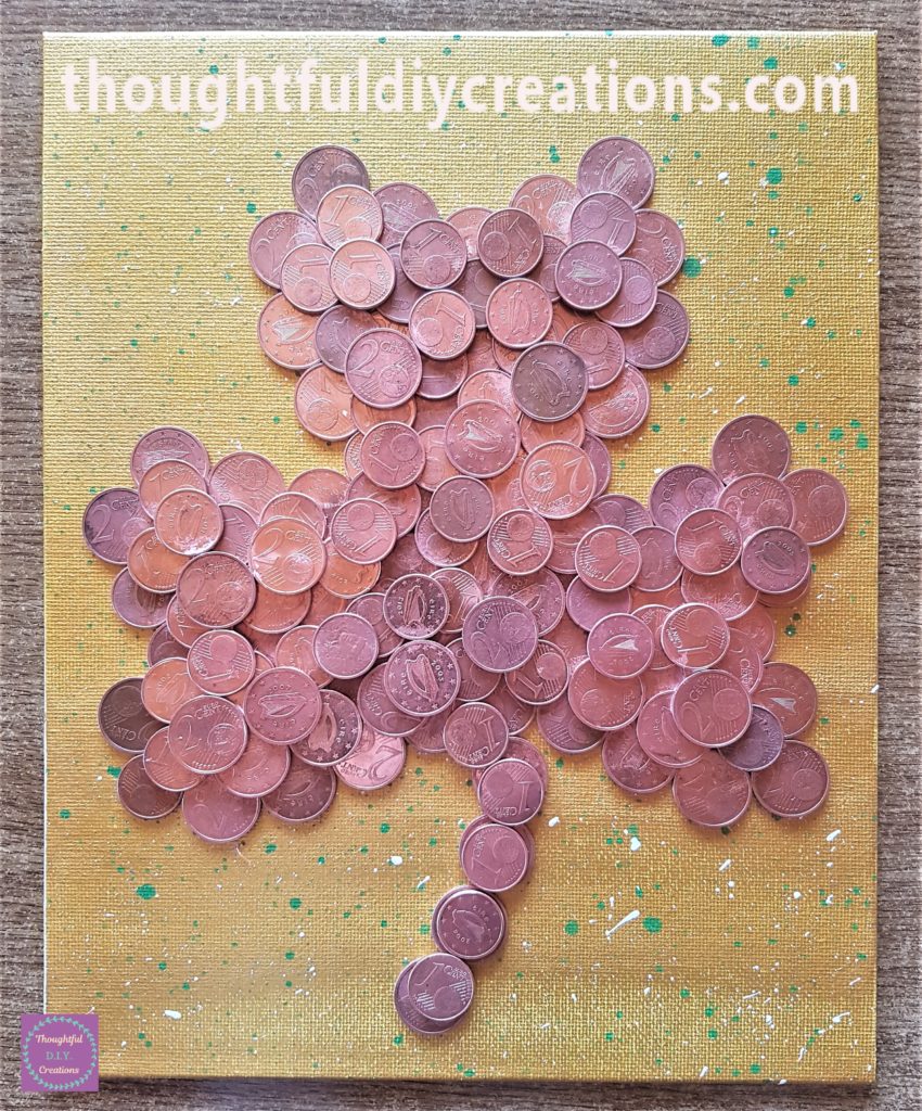 Any remaining gaps filled in on the canvas with the 1 and 2 cent coins.