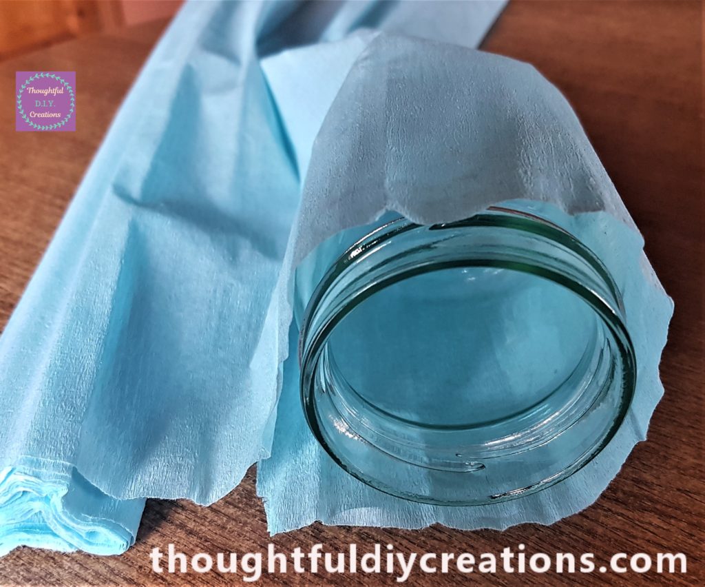 The crepe paper wrapped around the jar to get the width.