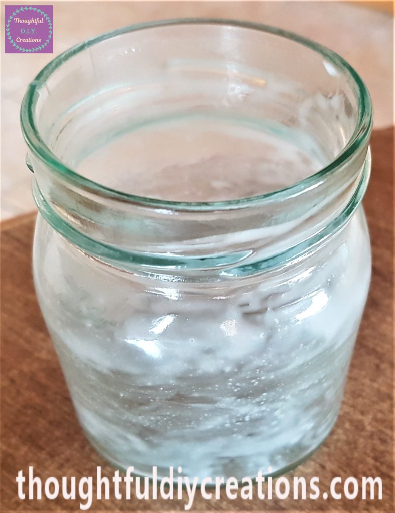 Glue spread evenly on the inside of the jar until the sides were covered.