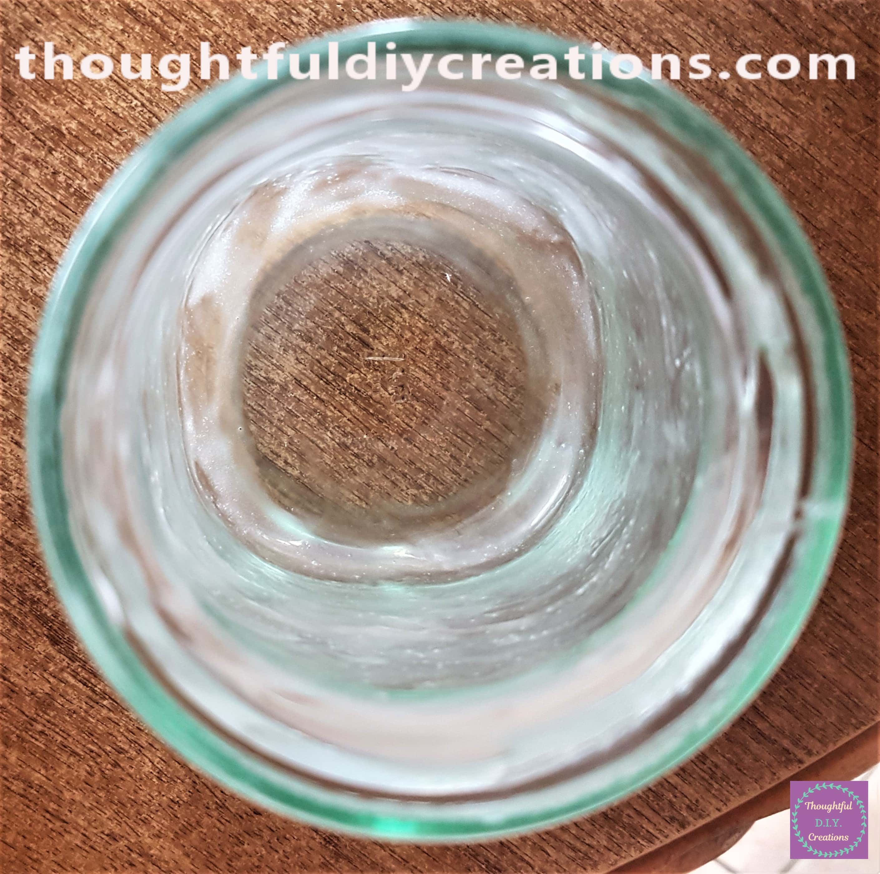 View of the inside of the jar with glue on it.