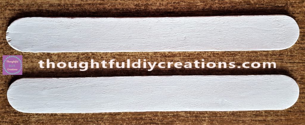 The second layer of white paint.