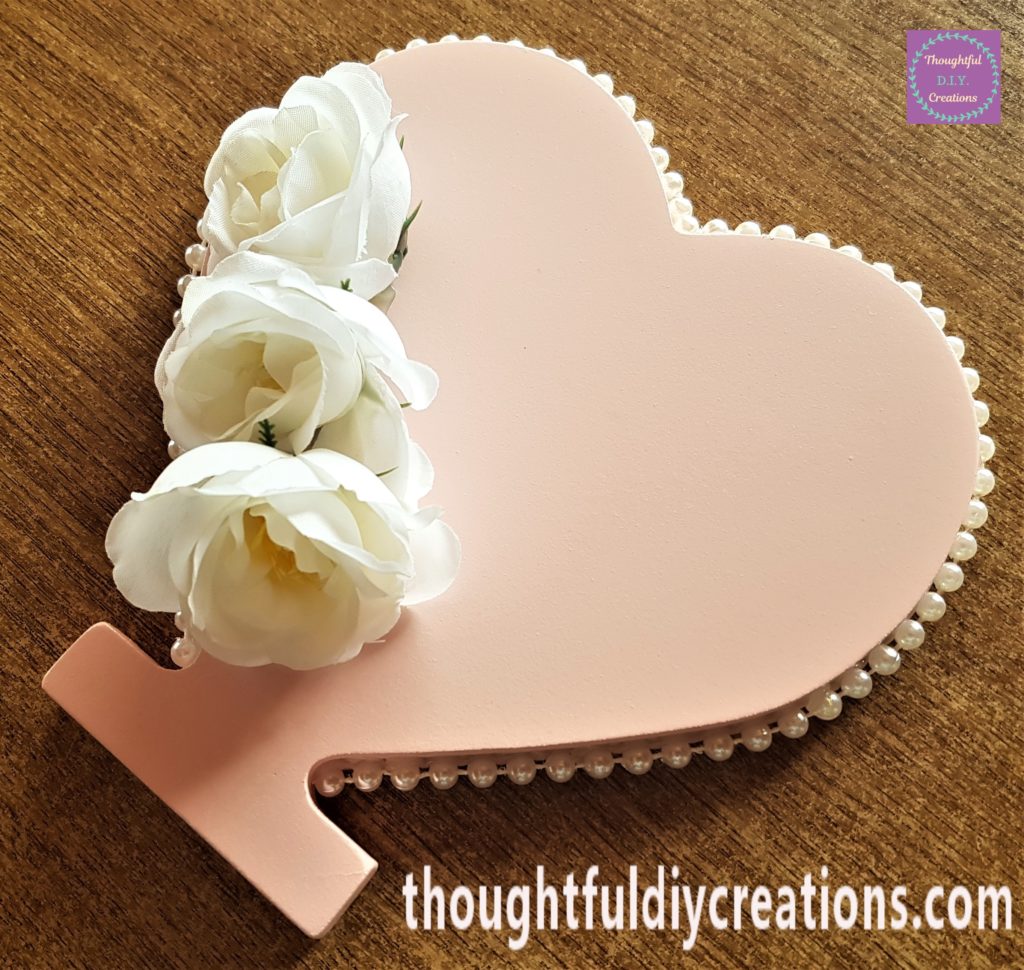 Side view of the flowers hot glued to the heart.