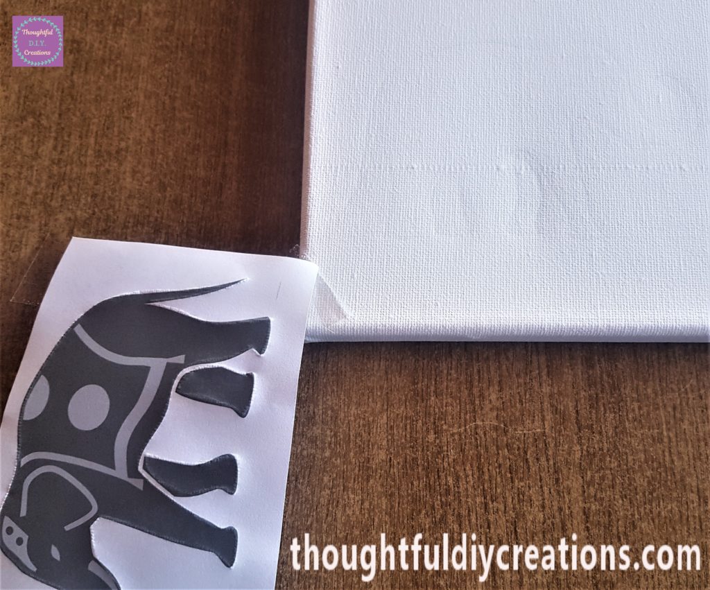 I traced around the outline of the elephant twice with a dark pencil.