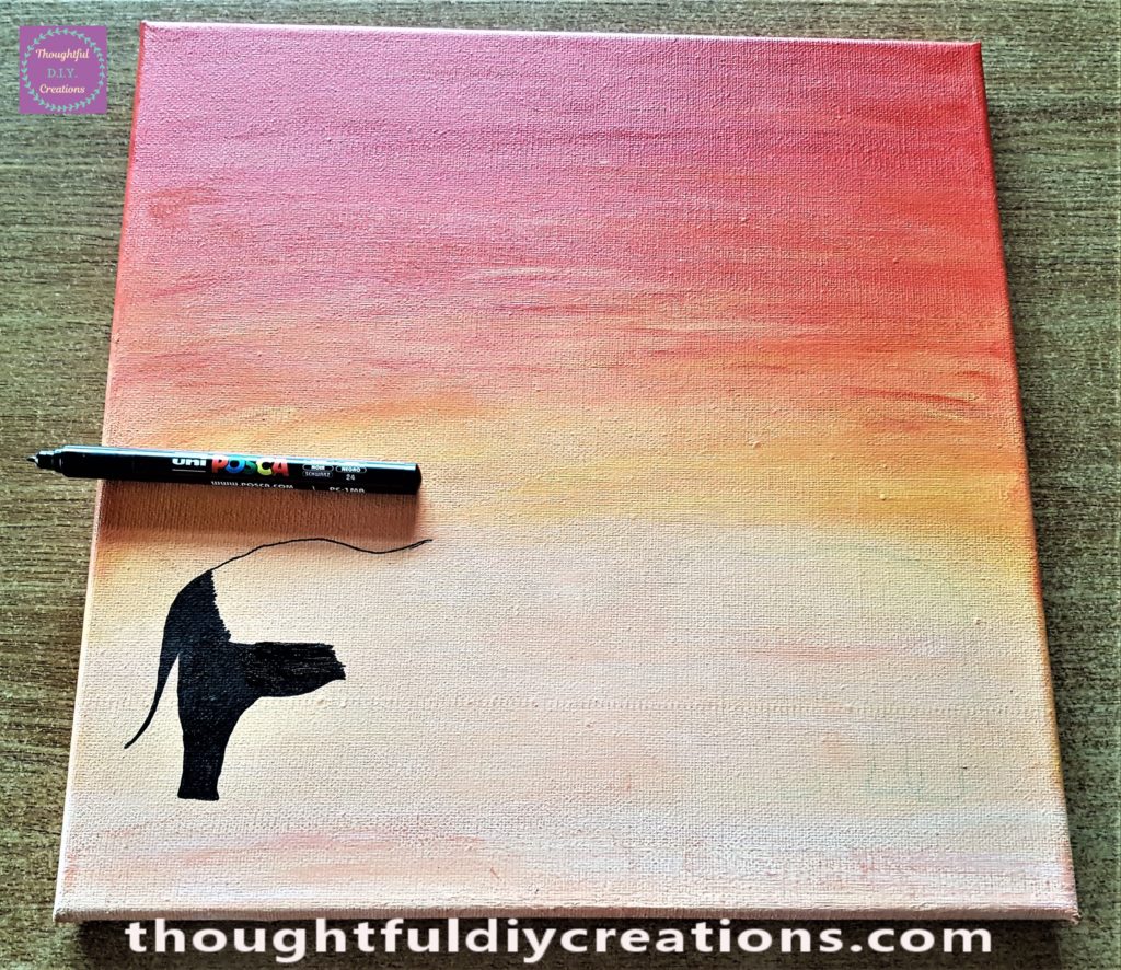 Black uni POSCA Paint Pen and started to fill in the first elephant.