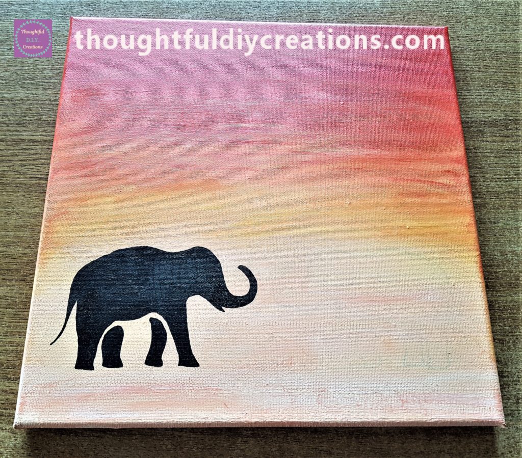 The elephant silhouette filled with black paint.