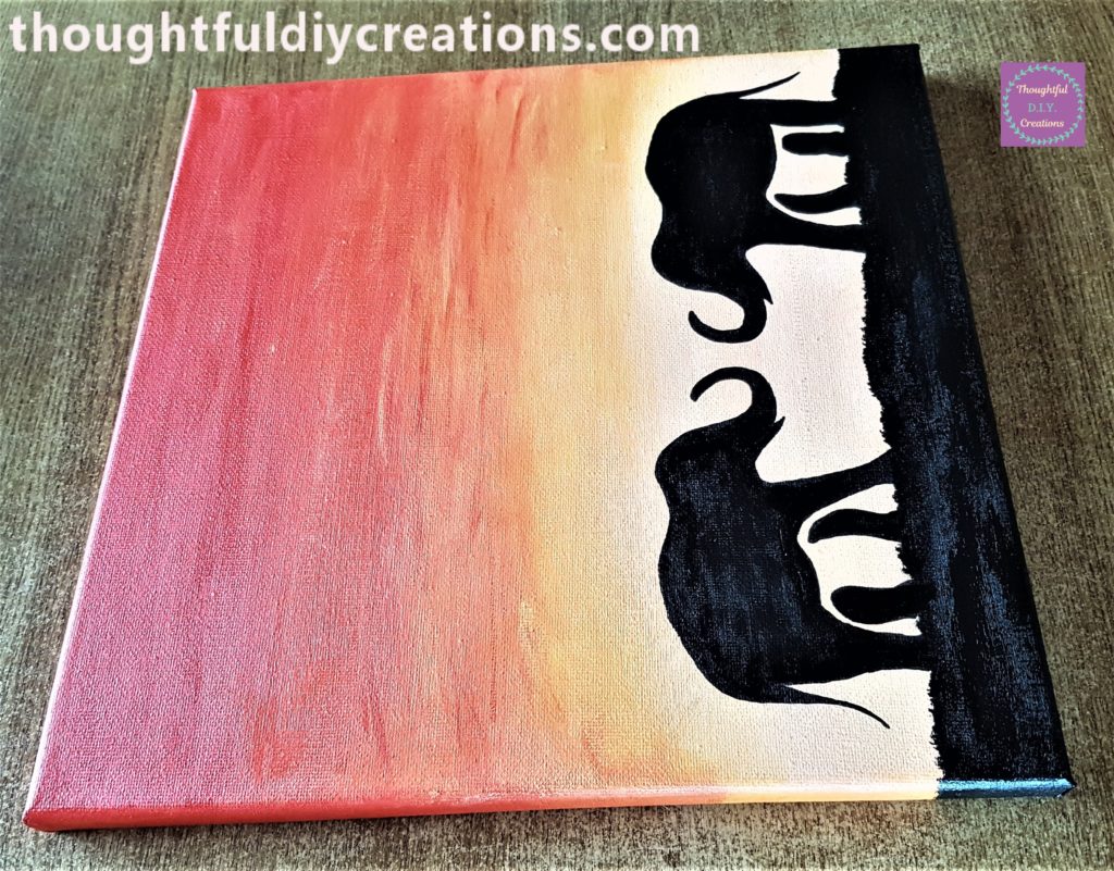 Side view of the elephant sunset painted canvas.