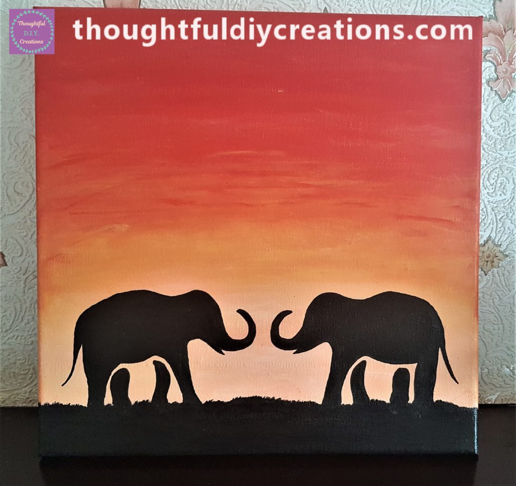 Finished canvas on the mantelpiece.