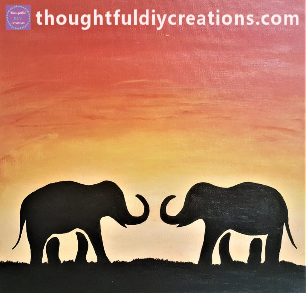 Close up image of the elephant sunset painted canvas.