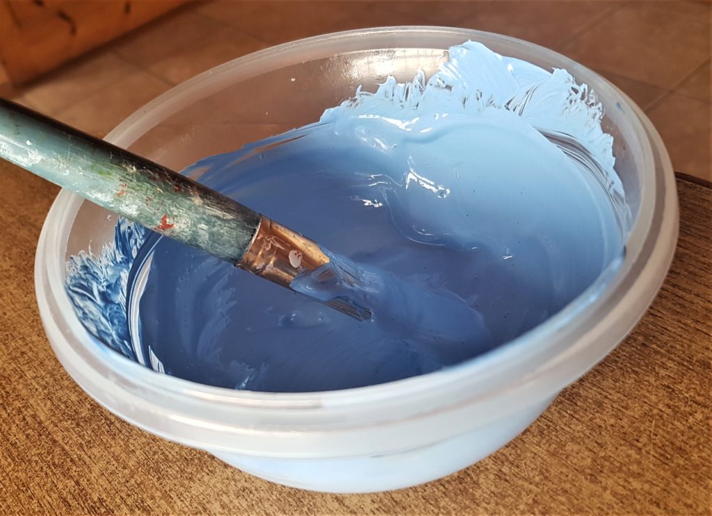 Close-up of the Paint mixture in a plastic bowl.