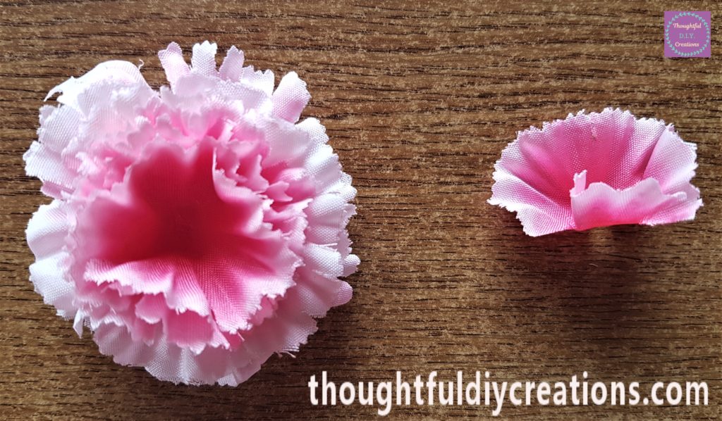 The flower with only 1 more petal to be added.