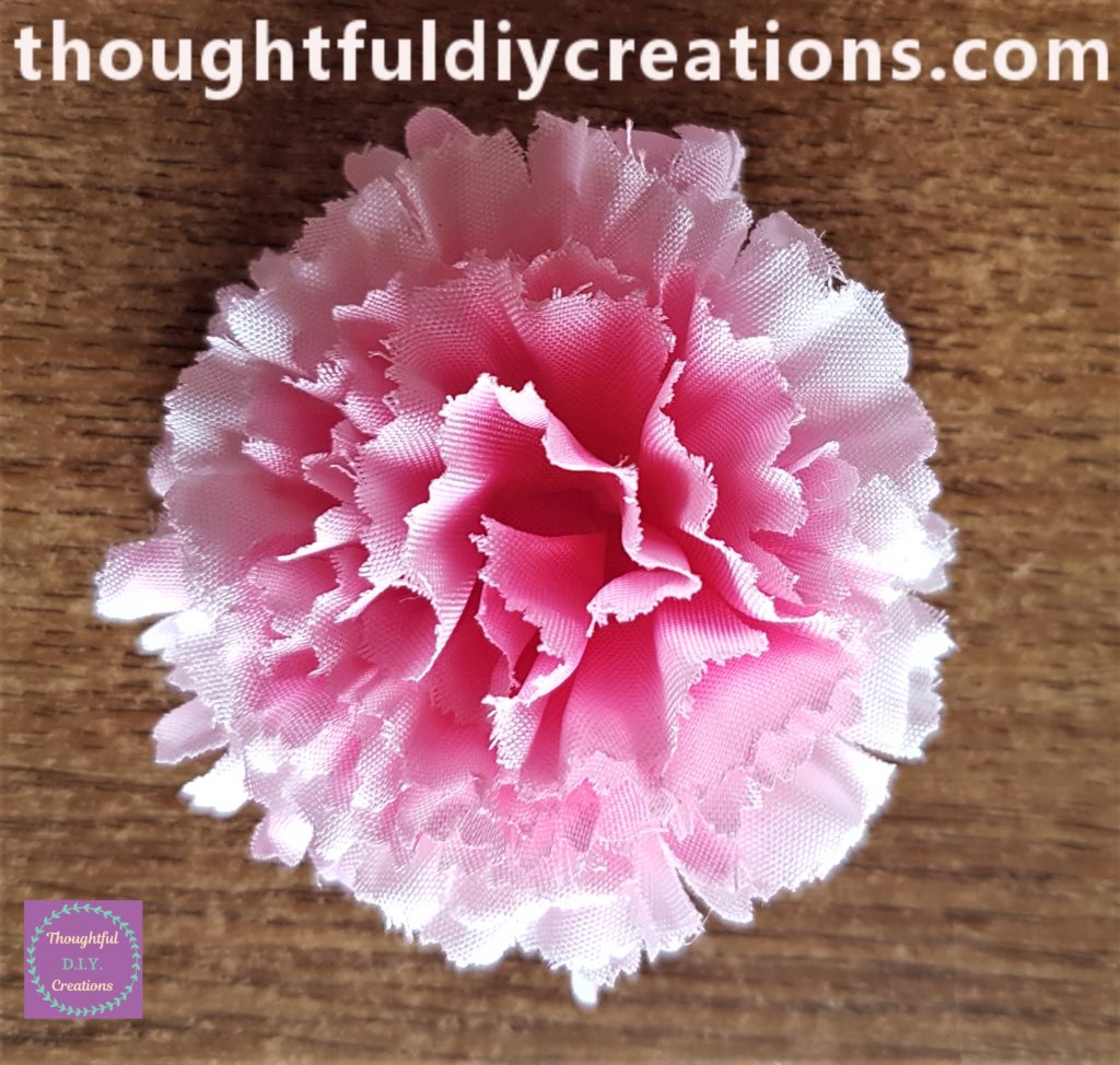 The completed flower with all the petals hot glued to the previous petal.