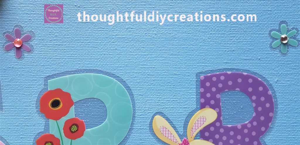 Pink Gemstone added to the Purple Flower, Clear Gemstone added to the Green Flower, Purple Gemstone added to the Pink Flower.