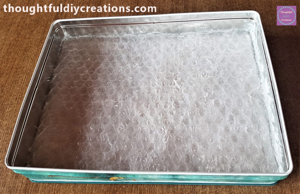 Third layer of bubble wrap added in the same way.