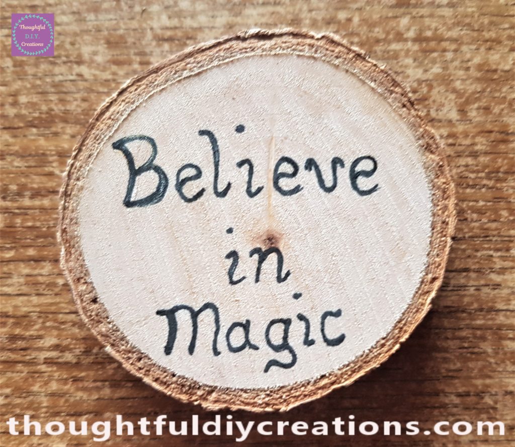 'Believe in Magic' wrote on the wood slice with a uni POSCA Paint Pen in Black 0.7mm.
