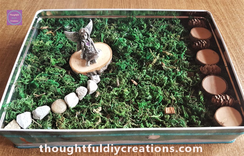 The Fairy added to her seat in the Fairy Garden.