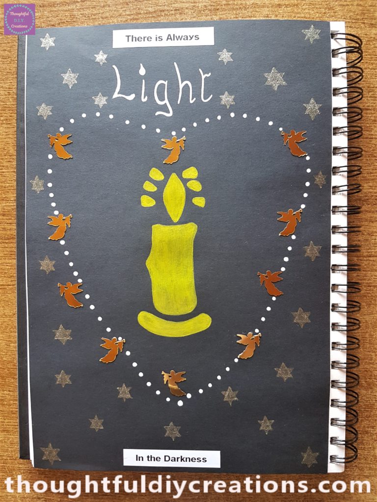 Glitter Yellow Gel Pen to draw and colour stars on the Black page.