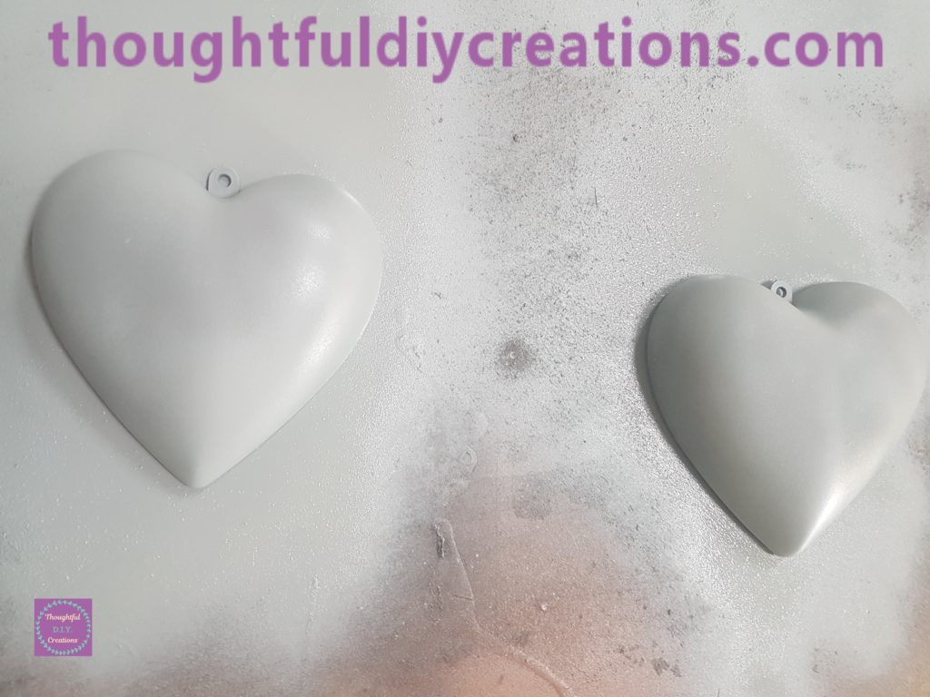 The hearts turned over and the outside of the hearts spray painted.