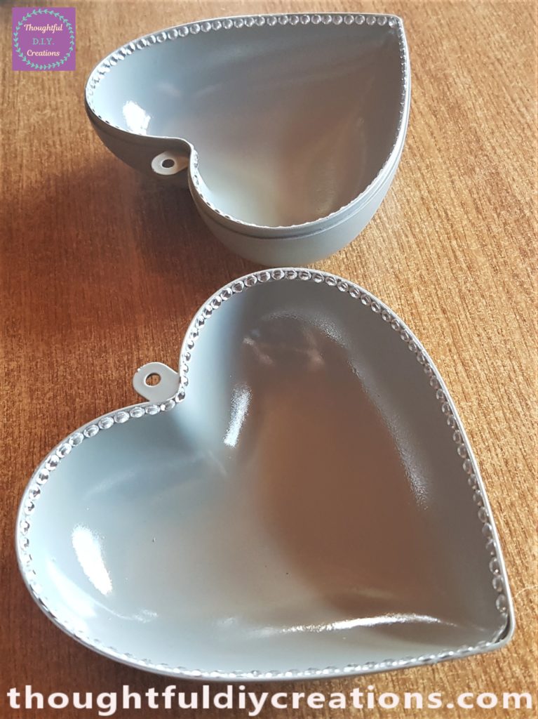 Side angle of the gemstones added to the 2 hearts.