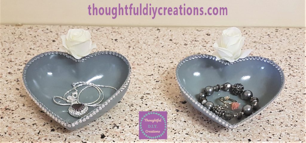 Chain in one Heart and a Bracelet and Ring in the other Heart.